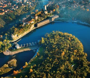 Aerial view of the Taccani hydroelectric power plant and the Adda River, Tezzo sull'Adda, Milan.