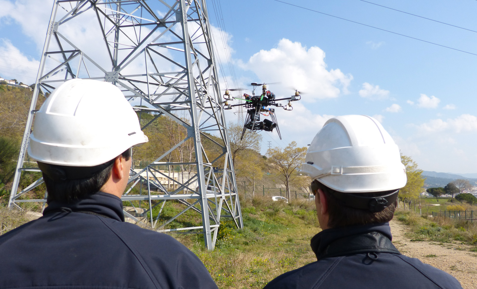 A drone takes off from among the pylons